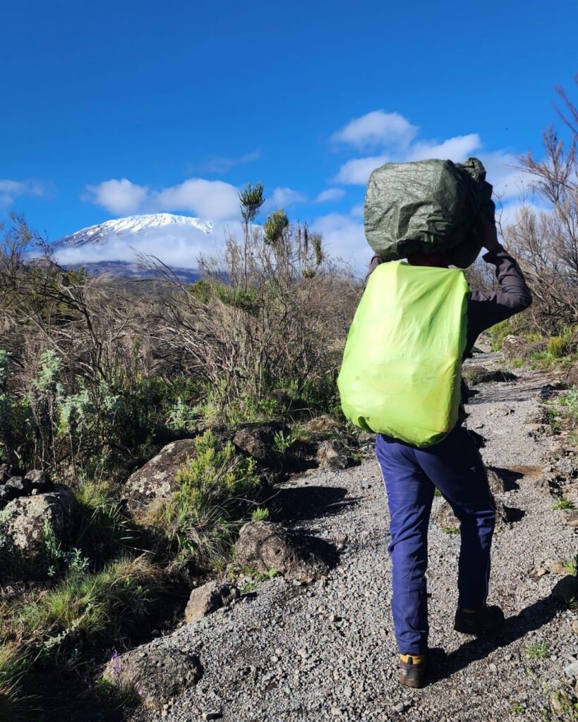 Kilimanjaro porter carrying gear during mountain expedition in Tanzania
