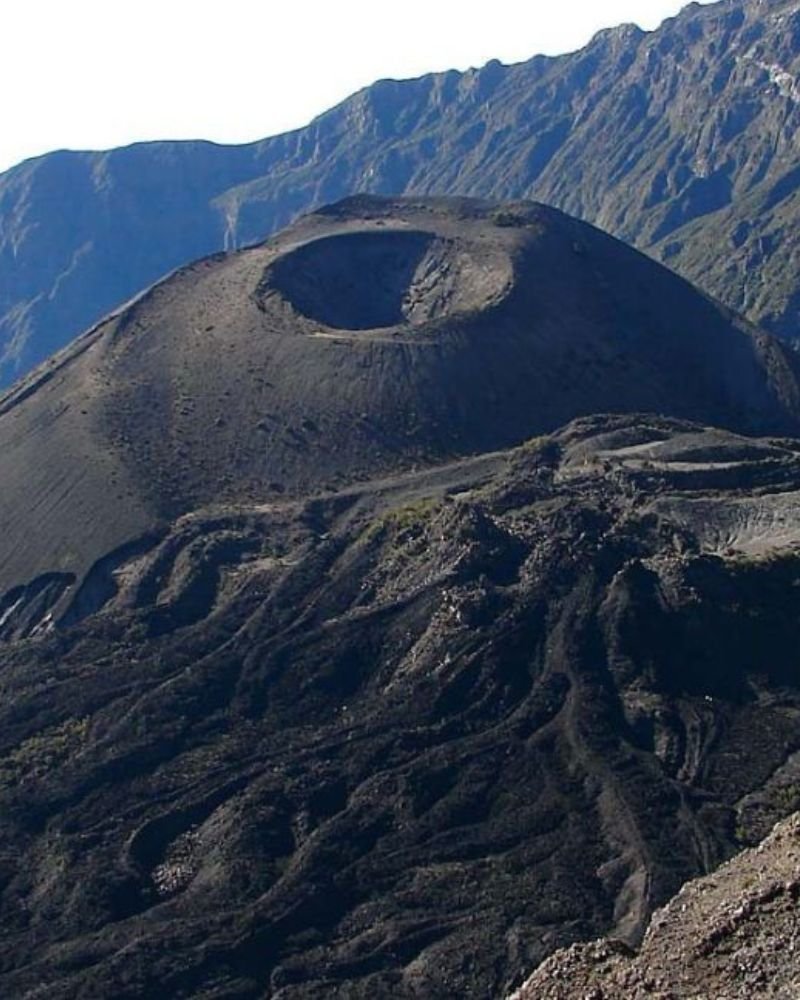 Hikers trekking on Mount Meru in Arusha National Park, Tanzania