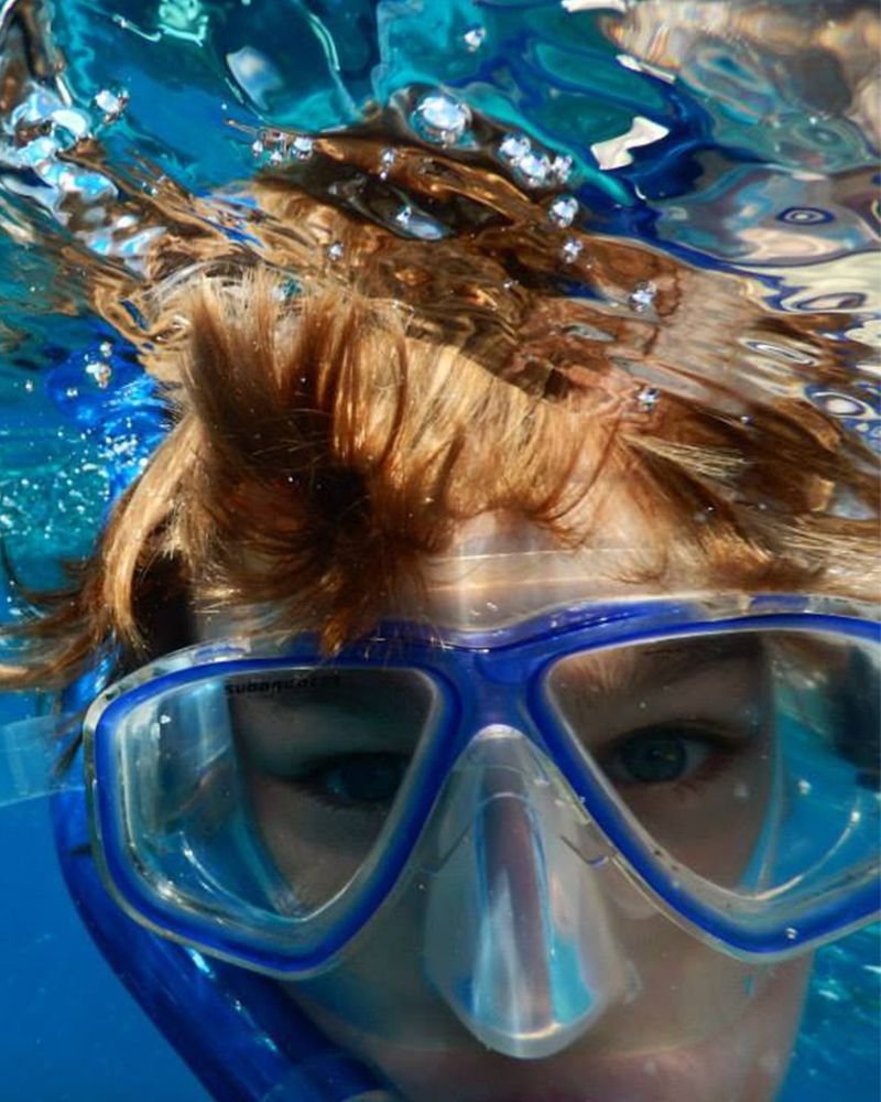 Snorkeling and scuba diving in the crystal-clear waters of Zanzibar, Tanzania